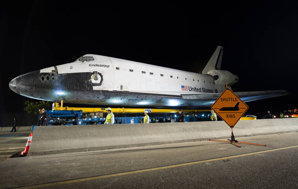 The space shuttle Endeavour is seen atop the Over Land Transporter (OLT)